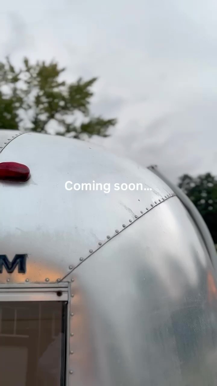 Reel: the Airstream up close under a grey sky, with the words “Coming soon…”